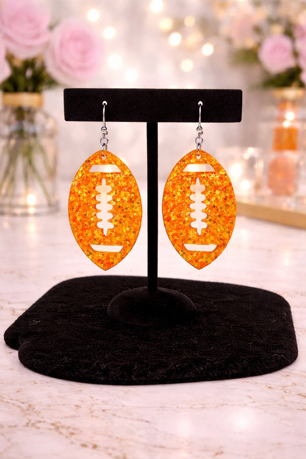 Orange Glitter Football Earrings